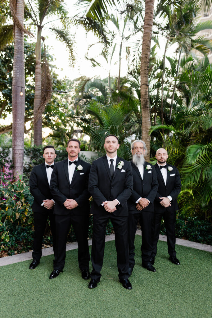 Luxury black tie groom photos at FL wedding venue